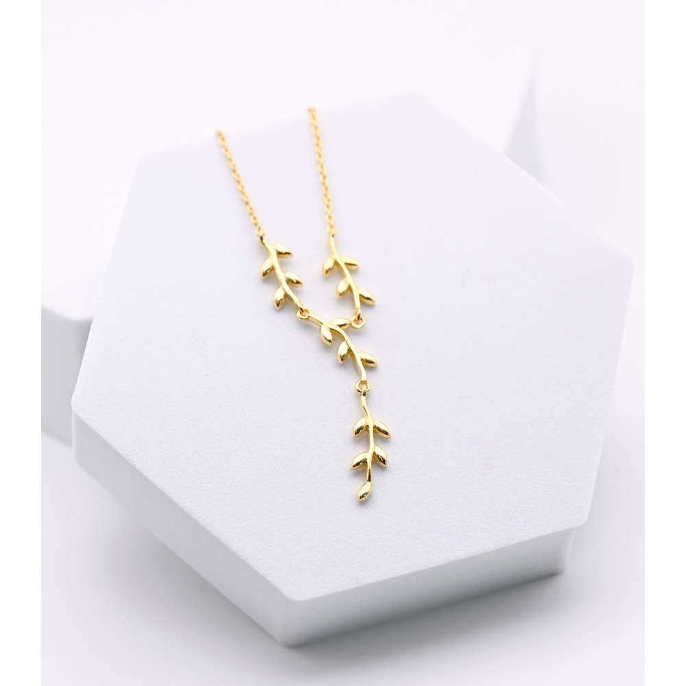 COLLAR ARTESANAL DE LATÓN CHAPADO EN ORO CON MOTIVO RAMAS