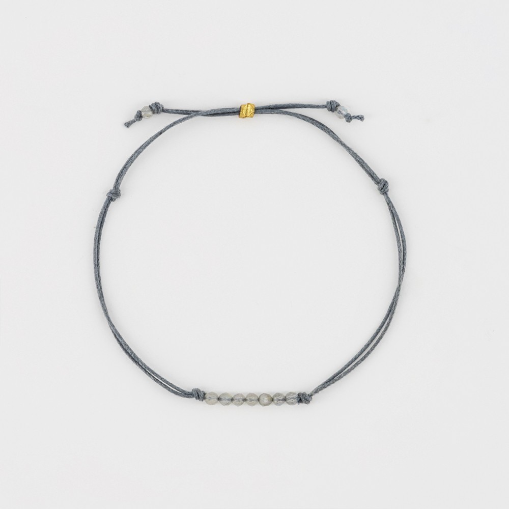 PULSERA ARTESANAL DE CORDÓN GRIS Y CUENTAS DE CUARZO